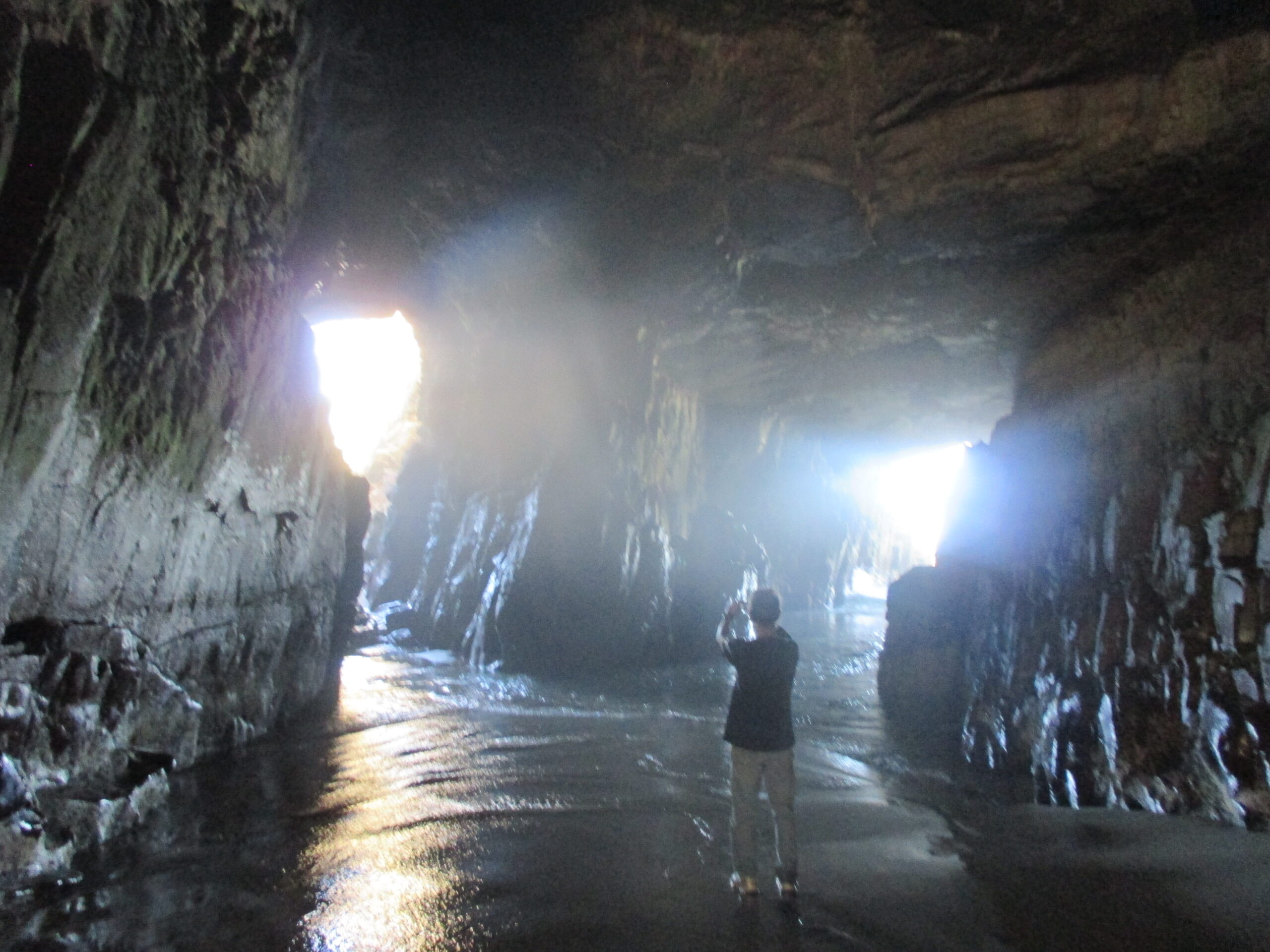 Roy in a cave, before the tide came in