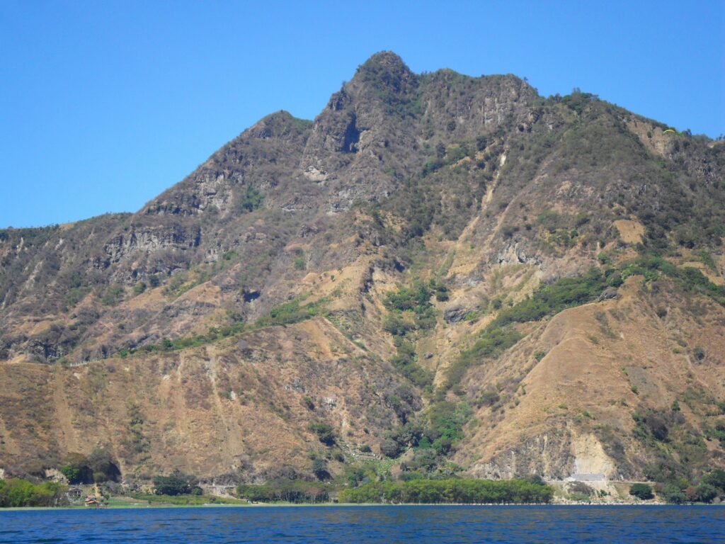 View from the kayak - the road out took a similar route seen on these slopes