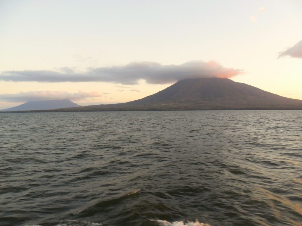 On the ferry to Ometepe - with the volcanoes under cloud