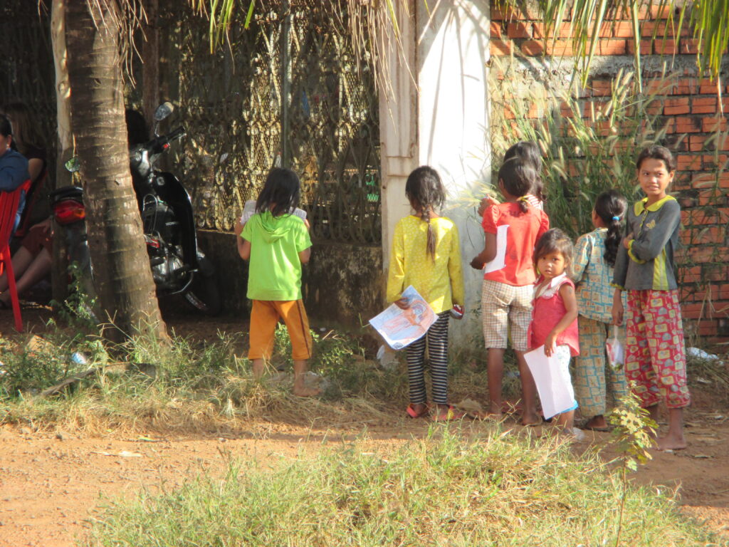 Chatted to some Cambodian children, while waiting for the bus